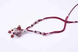 Collier aromathérapique Rouge Finesse, pièce